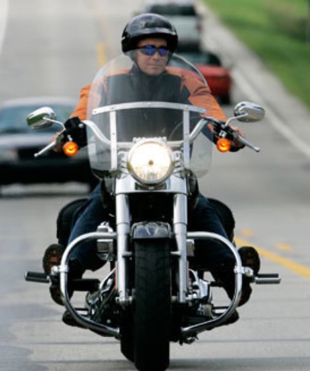 Former Indiana Governor Mitch Daniels riding his custom-built Harley.
