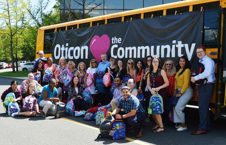 Featured image for “Oticon Employees Stuff the Bus with Backpacks and School Supplies for Local Students”